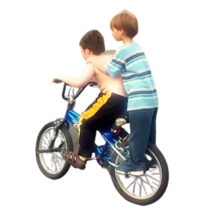 kid riding on the back of bike with pegs